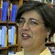 Candy Roberts Woman with glasses and short dark hair